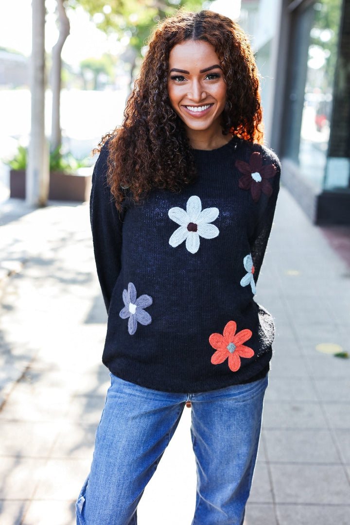 Stilla | Overstørrelse Sweater Af Sort Strik Med Blomsterpatch
