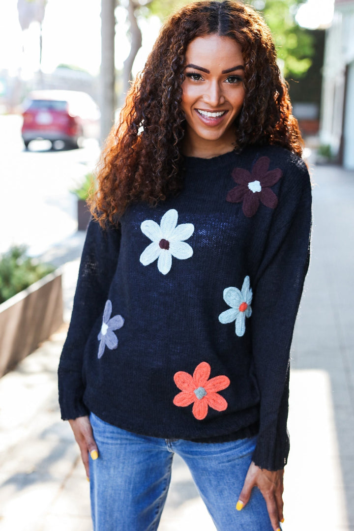 Stilla | Overstørrelse Sweater Af Sort Strik Med Blomsterpatch