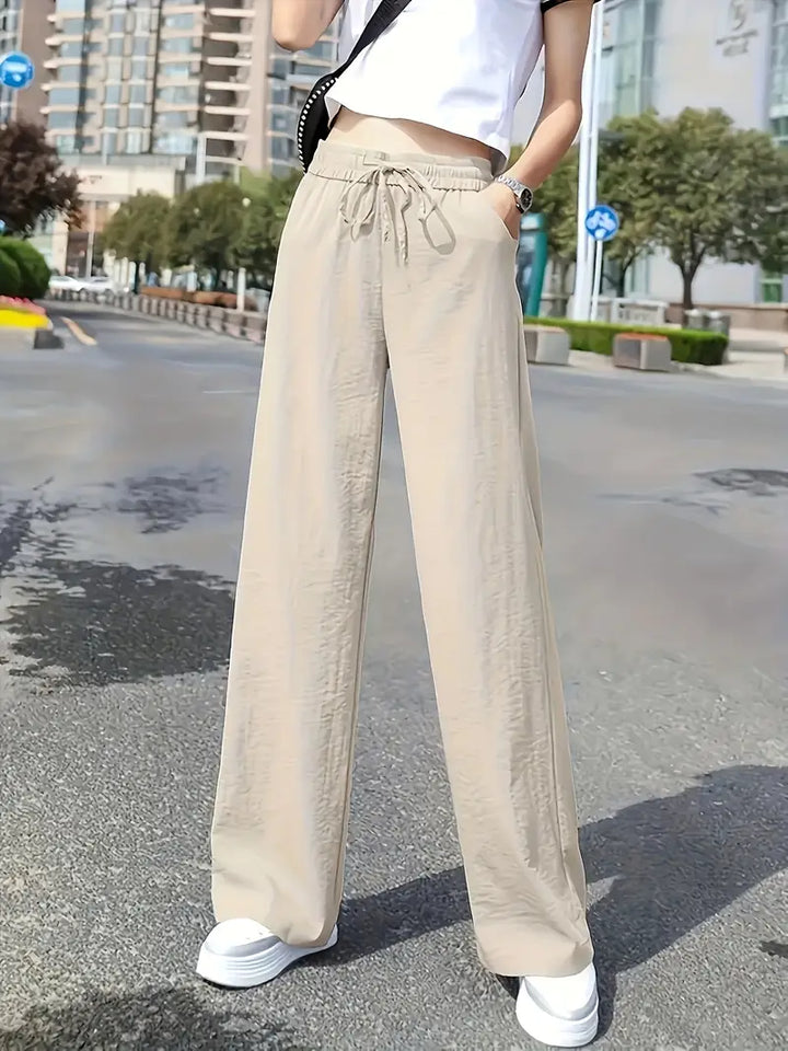 Stilla | Elegant, Høje Beige Bukser Med Lige Ben Og Snøring.