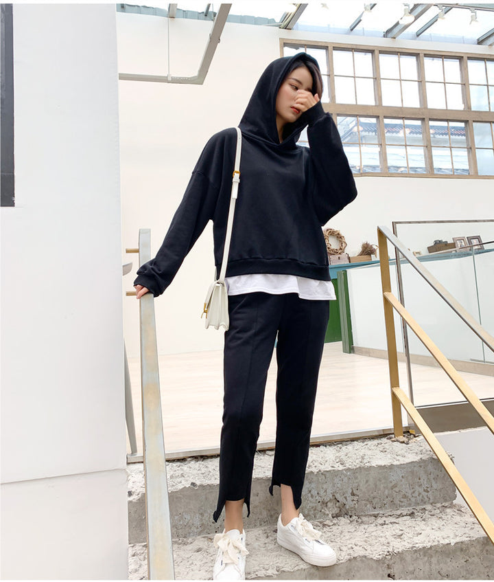 Kvindernes komfortable fritidsensemble med afslappet hættetrøje og slim-fit joggingbukser Stilla