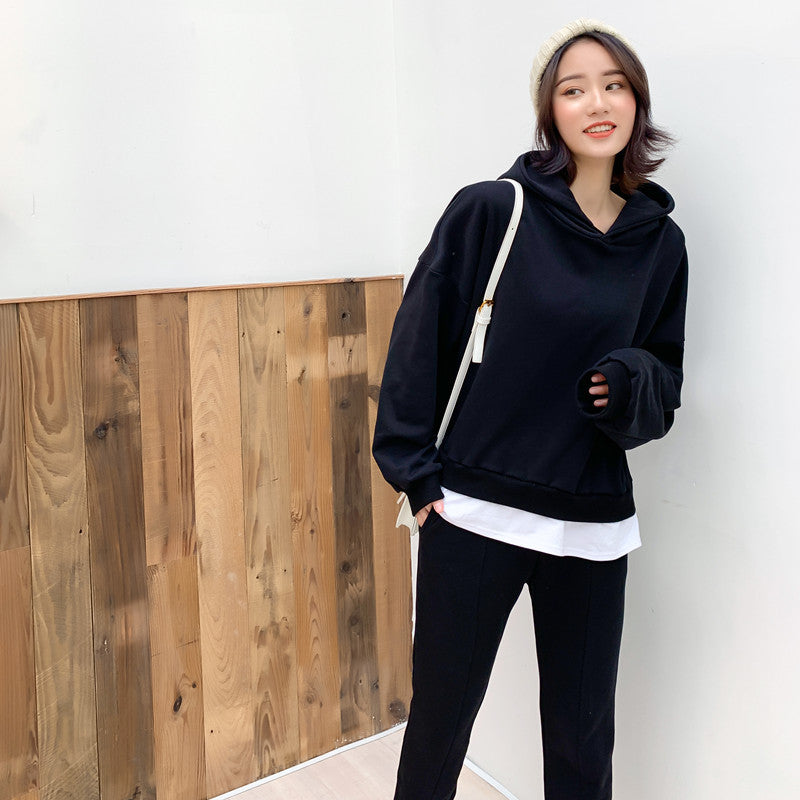 Kvindernes komfortable fritidsensemble med afslappet hættetrøje og slim-fit joggingbukser Stilla