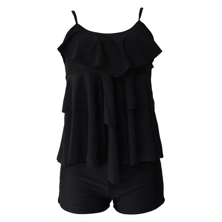 Dame badedragt med voluminøst flæsedesign og shorts Stilla
