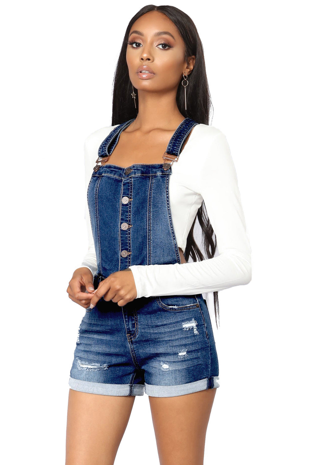Dame denim-overalls med justerbare skulderstropper og moderne destroyed-detaljer Stilla
