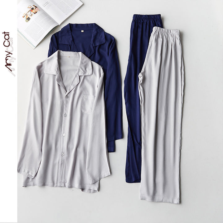 Dame luksuriøst pyjamas-sæt i åndbart satin med elegant knaplukning Stilla