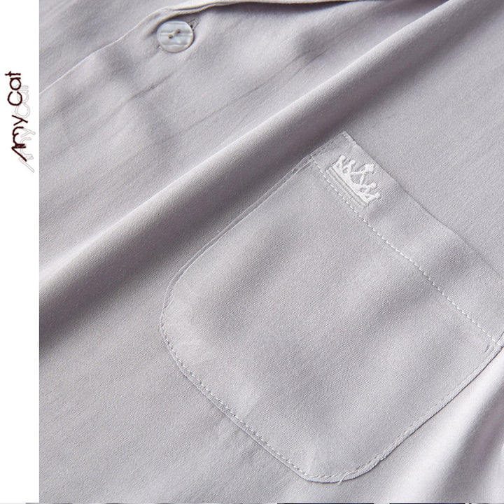 Dame luksuriøst pyjamas-sæt i åndbart satin med elegant knaplukning Stilla