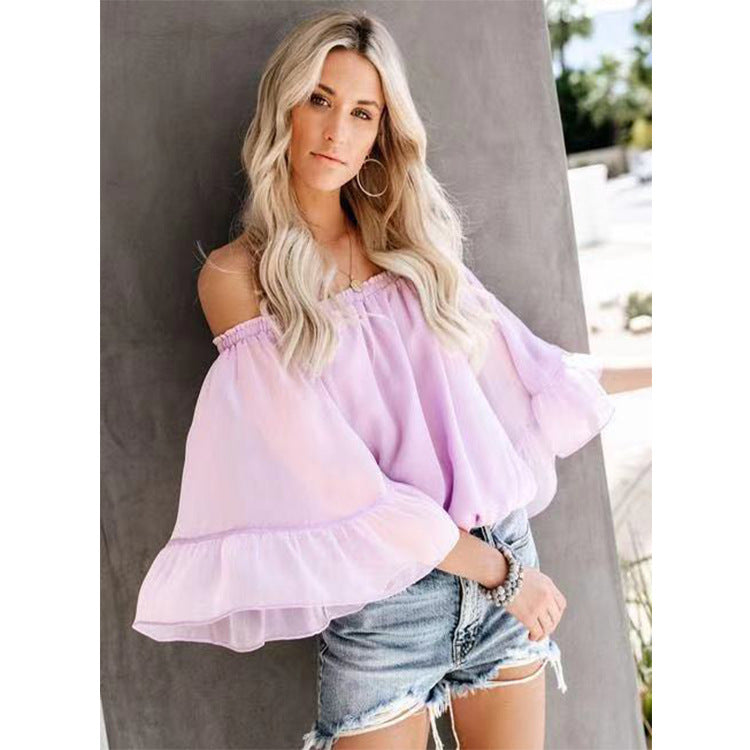 Kvinders bluse med bred ærme og off-shoulder design Skovae