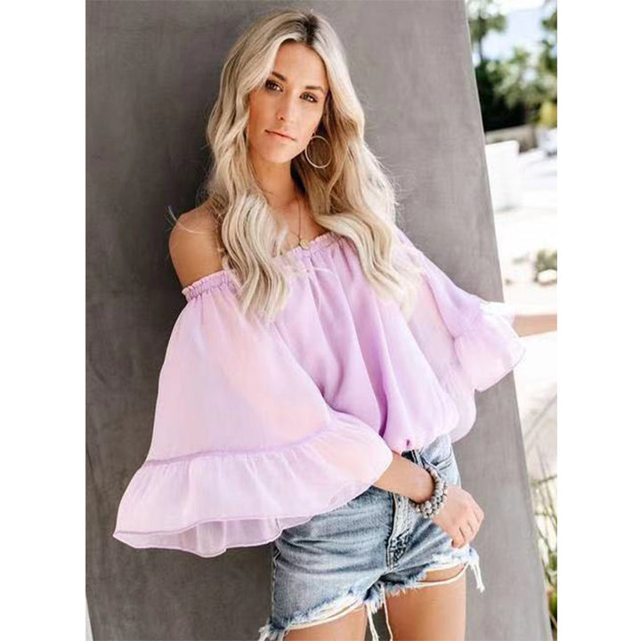 Kvinders bluse med bred ærme og off-shoulder design Skovae