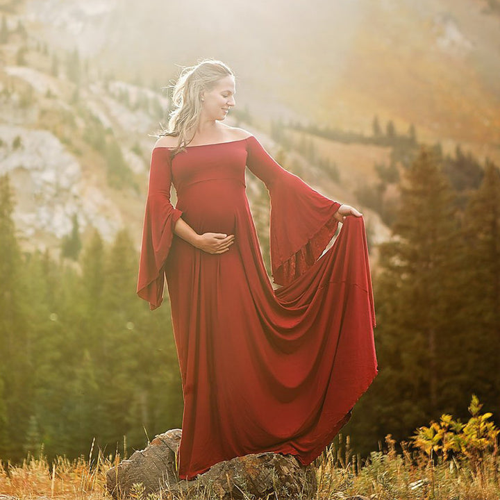 Kvinders graviditet maxi kjole med off-shoulder design og flydende ærmer Skovae