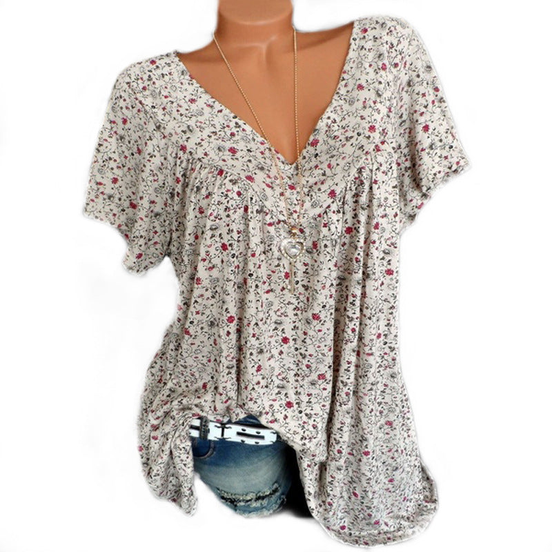 Dame afslappet bluse med blomstermotiv og luftige ærmer Skovae