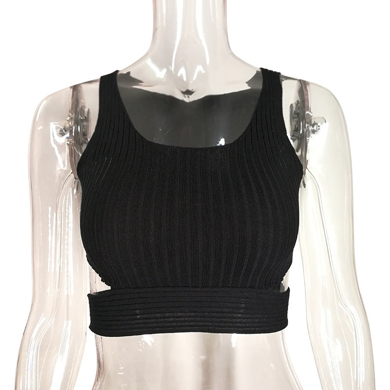 Dame Strikcrop-top med dyb rygudskæring og bred ribdesign Stilla