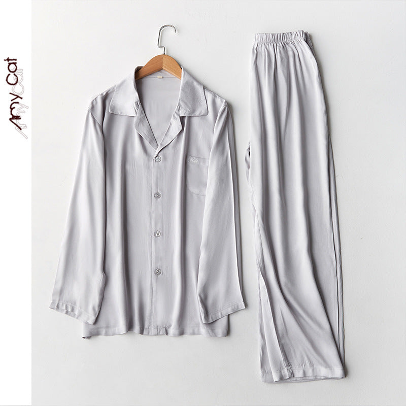 Dame luksuriøst pyjamas-sæt i åndbart satin med elegant knaplukning Stilla