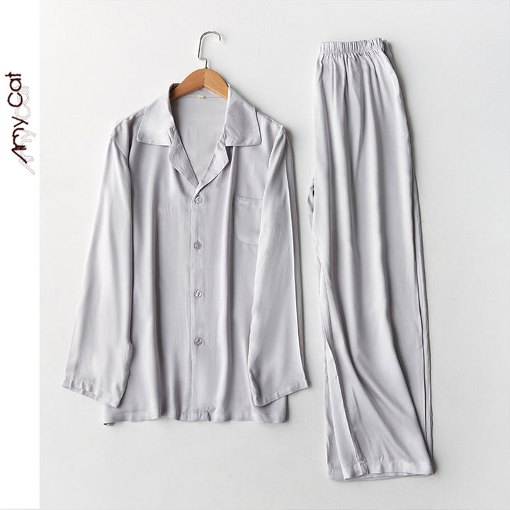 Dame luksuriøst pyjamas-sæt i åndbart satin med elegant knaplukning Stilla