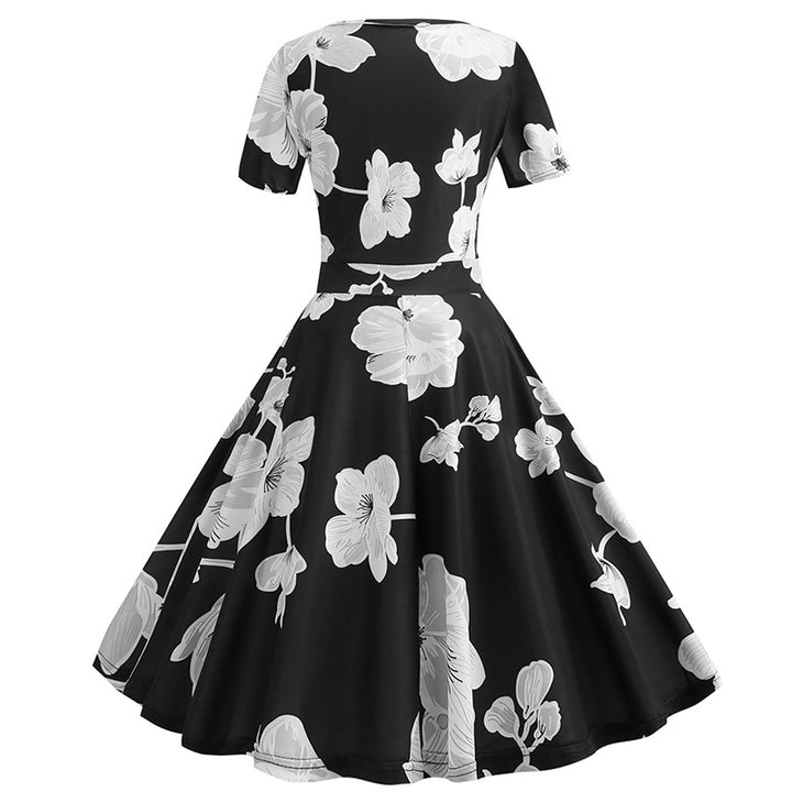 Dame indpakke kjole med blomsterdesign og elegant V-hals Stilla