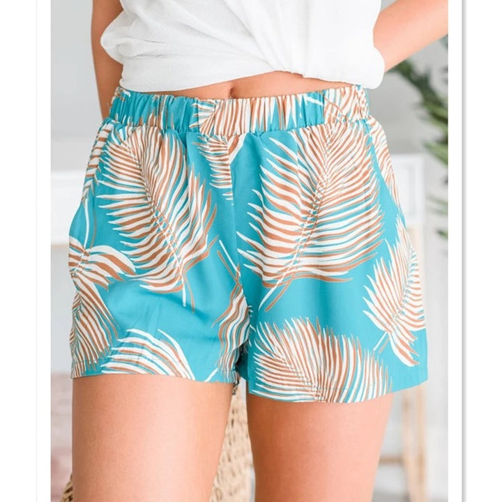 Kvinders lette strandshorts med elastisk talje og tropisk bladdesign
