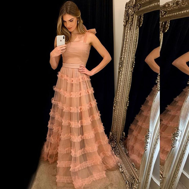 Dame maxikjole med voluminøse flæseskaber og strapless design Stilla