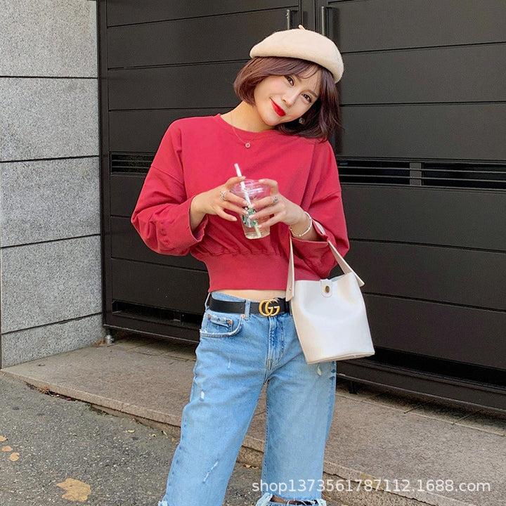 Kvindernes stribede cropped sweater med ballonærmer Stilla