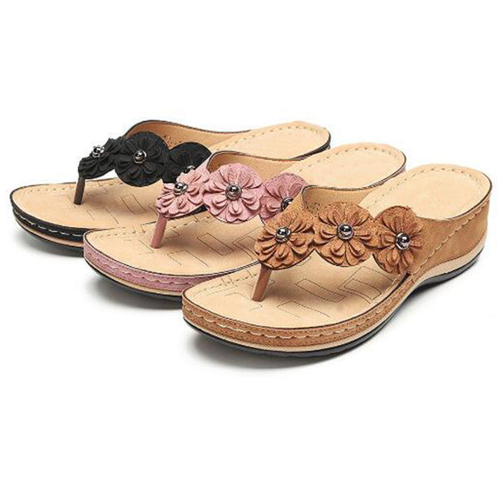 Dame flip-flops med dekorative blomsterapplikationer Stilla