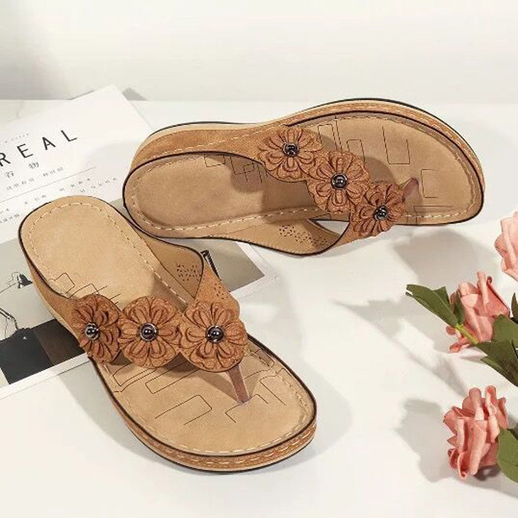 Dame flip-flops med dekorative blomsterapplikationer Stilla