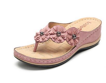 Dame flip-flops med dekorative blomsterapplikationer Stilla