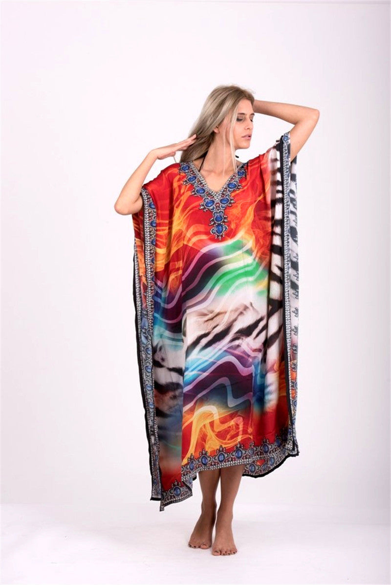 Dame kaftan med blomstret og abstrakt design Stilla