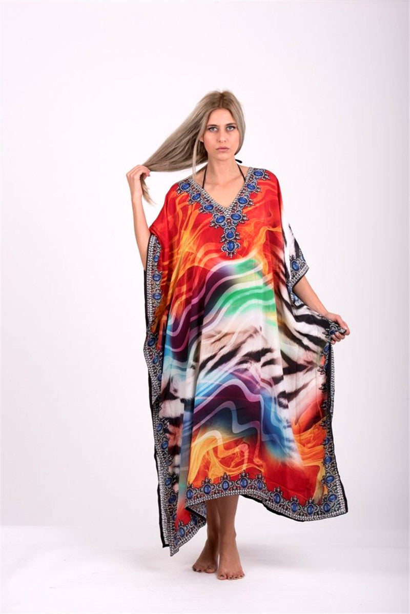 Dame kaftan med blomstret og abstrakt design Stilla