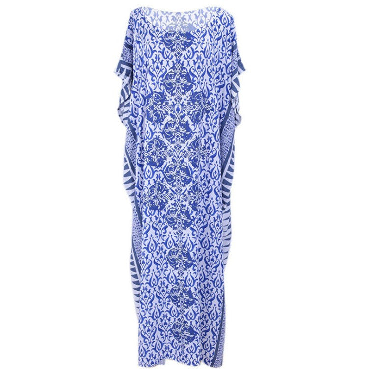 Dame Maxi-strandkjole med stilfuldt floralt design og luftig silhuet Stilla