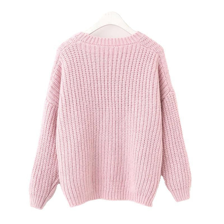 Kvinders casual strikket sweater med unikke knapdetaljer og oversized snit Stilla