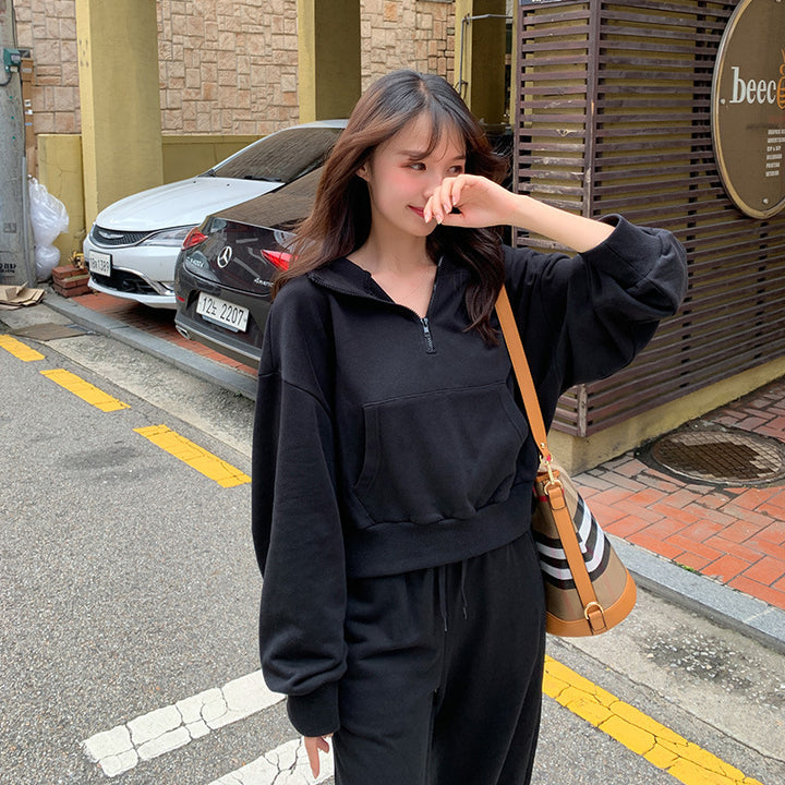 Kvinders sporty loungewear sæt med casual zip top og bredskårede bukser Stilla