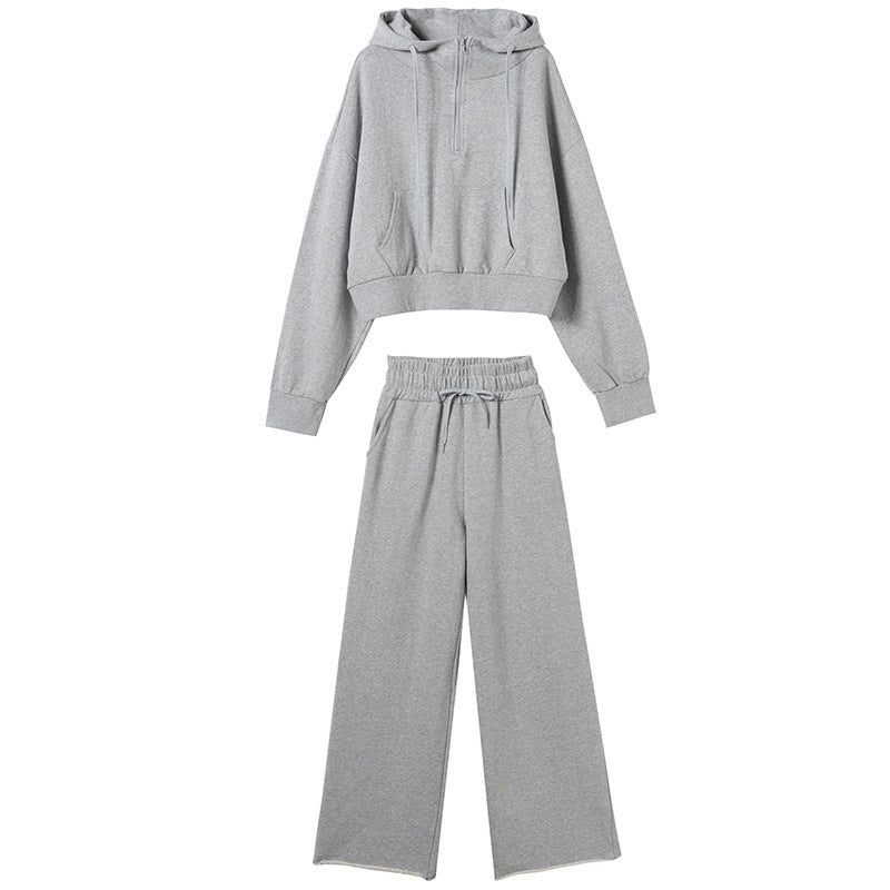 Kvinders sporty loungewear sæt med casual zip top og bredskårede bukser Stilla
