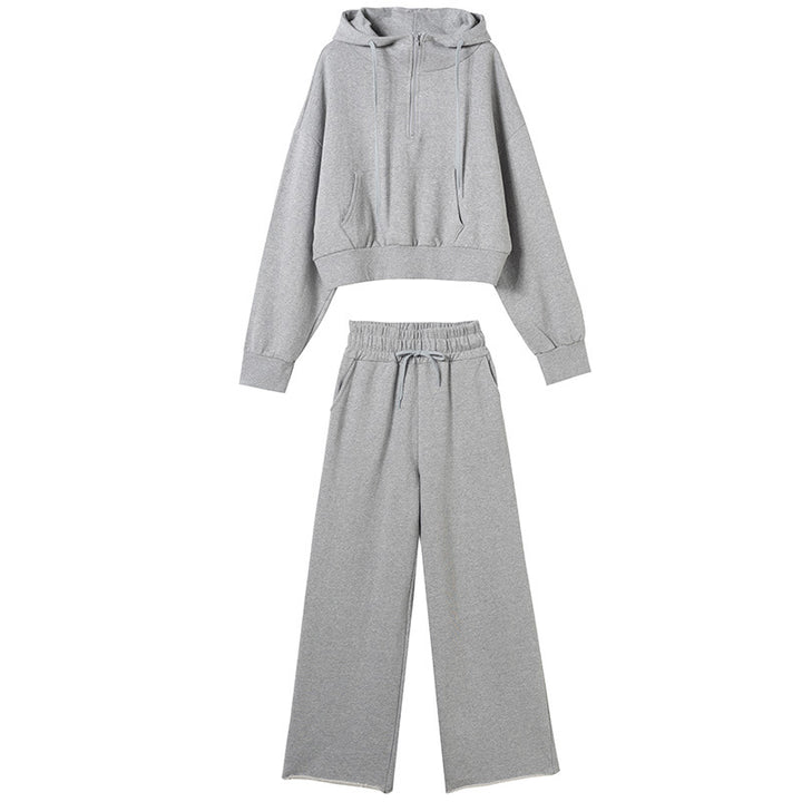 Kvinders sporty loungewear sæt med casual zip top og bredskårede bukser Stilla