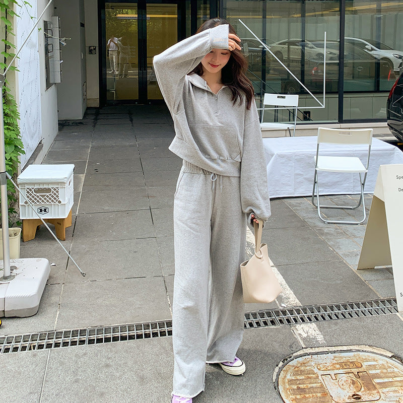 Kvinders sporty loungewear sæt med casual zip top og bredskårede bukser Stilla