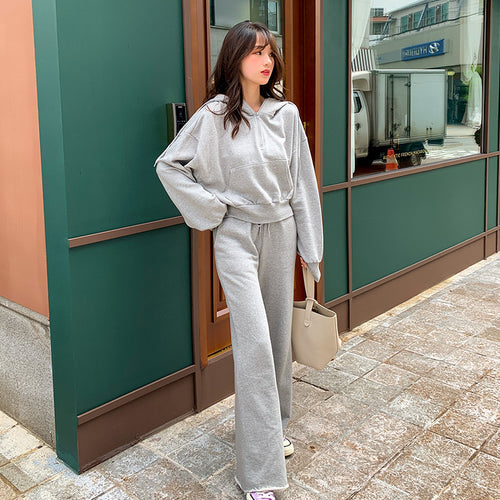 Kvinders sporty loungewear sæt med casual zip top og bredskårede bukser Stilla