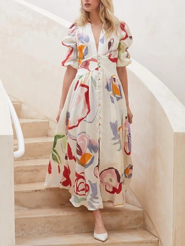 Dame Maxi-kjole med iøjnefaldende floralt design og volumetriske ærmer Stilla