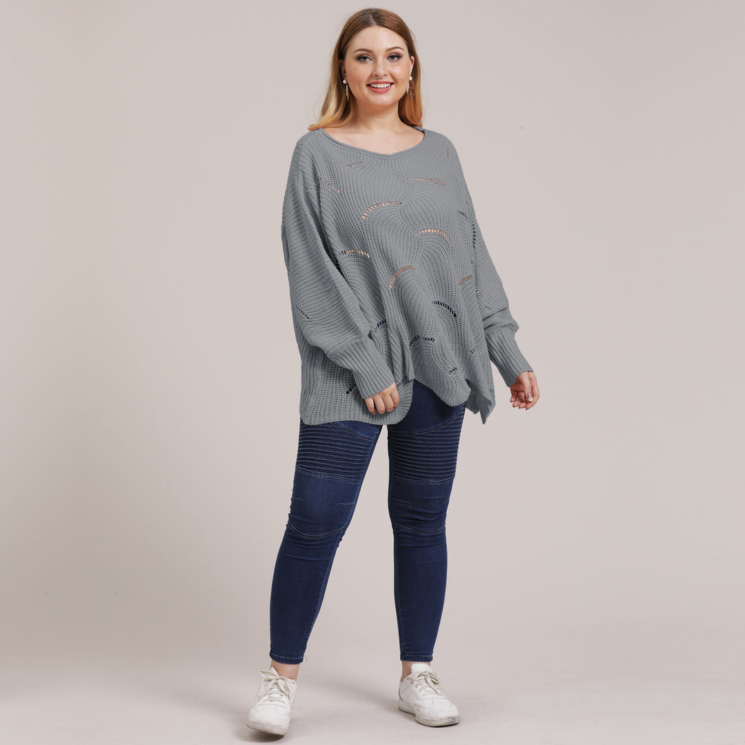 Dame luftig grovstrikket sweater med moderne hulmønster Stilla