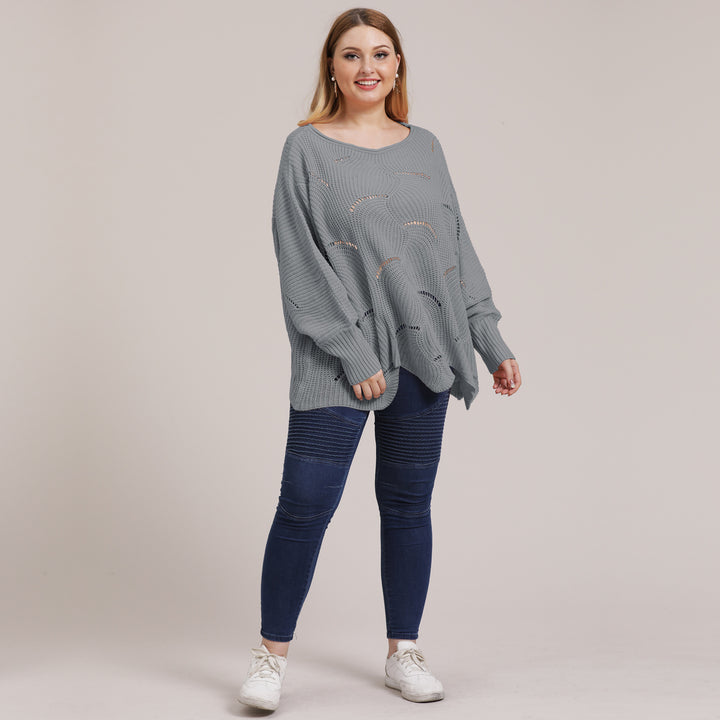 Dame luftig grovstrikket sweater med moderne hulmønster Stilla
