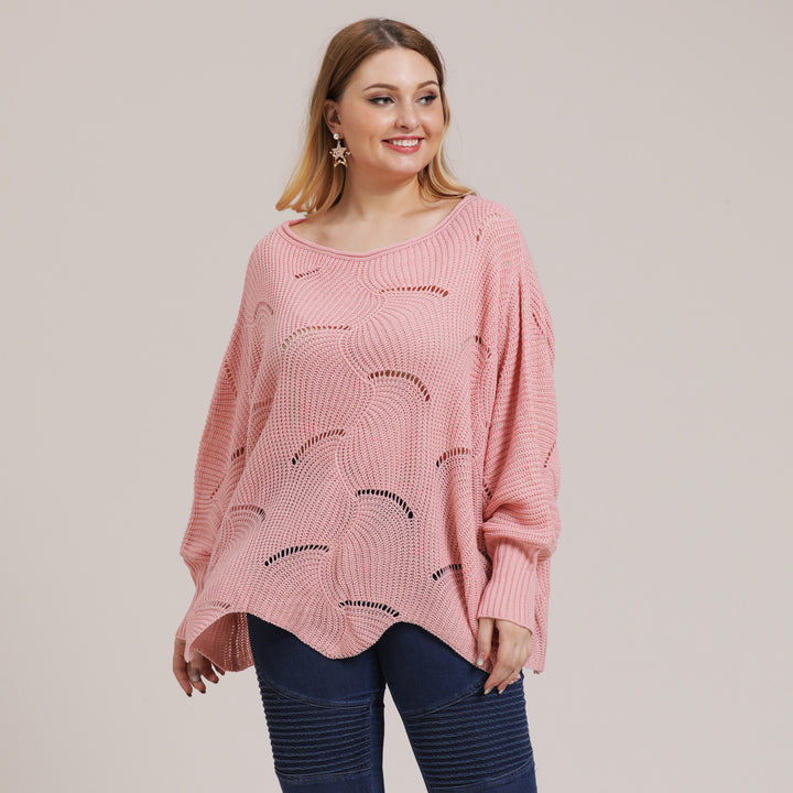 Dame luftig grovstrikket sweater med moderne hulmønster Stilla