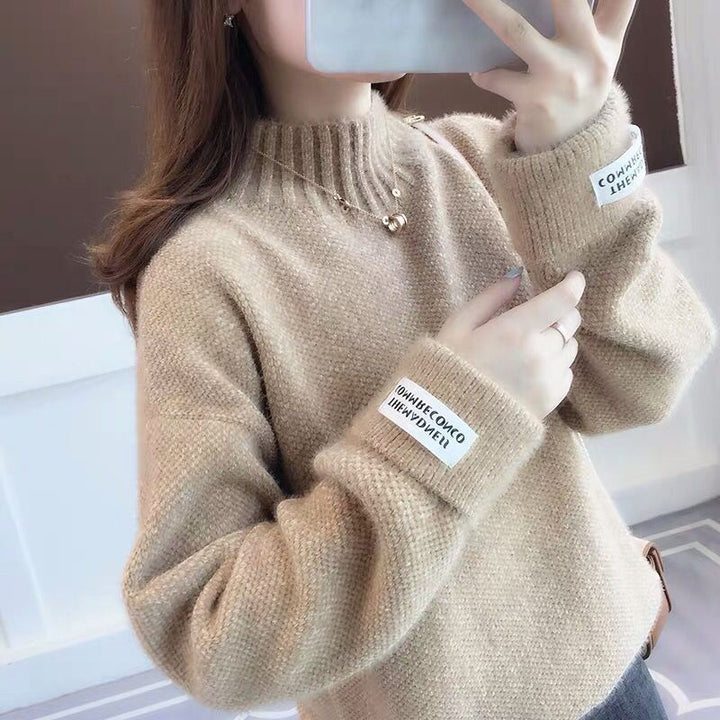 Damer fashionabel sweater med høj krave og tekstureret design Stilla