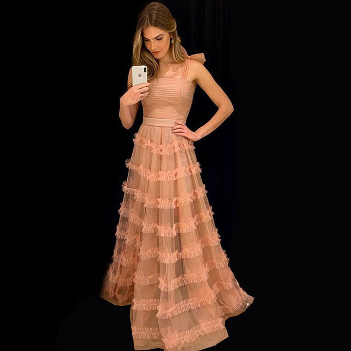 Dame maxikjole med voluminøse flæseskaber og strapless design Stilla