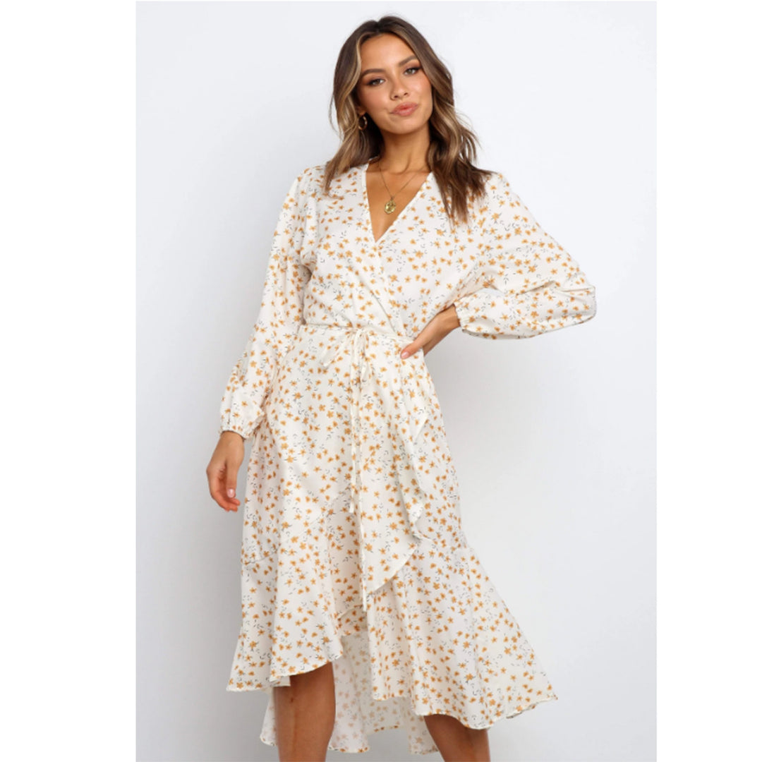 Women's wrap dress with playful floral print and flowing skirt Skovae