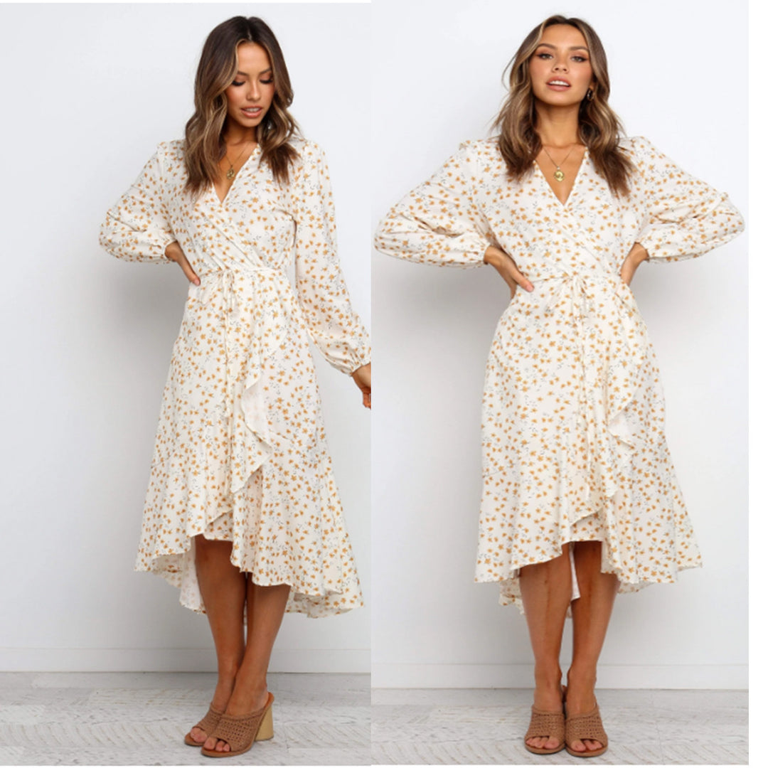 Women's wrap dress with playful floral print and flowing skirt Skovae