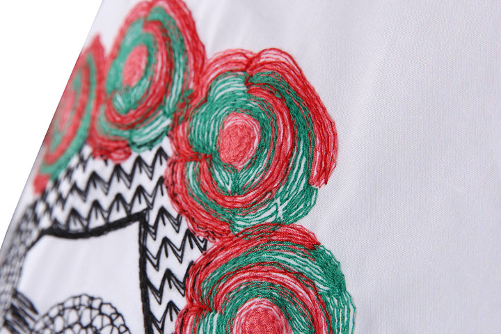 Damebluse med farverige broderier og moderne krave Stilla