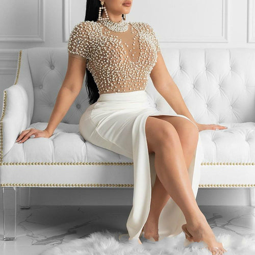 Damer Elegant kjole med transparente pufærmer og perle accenter Skovae