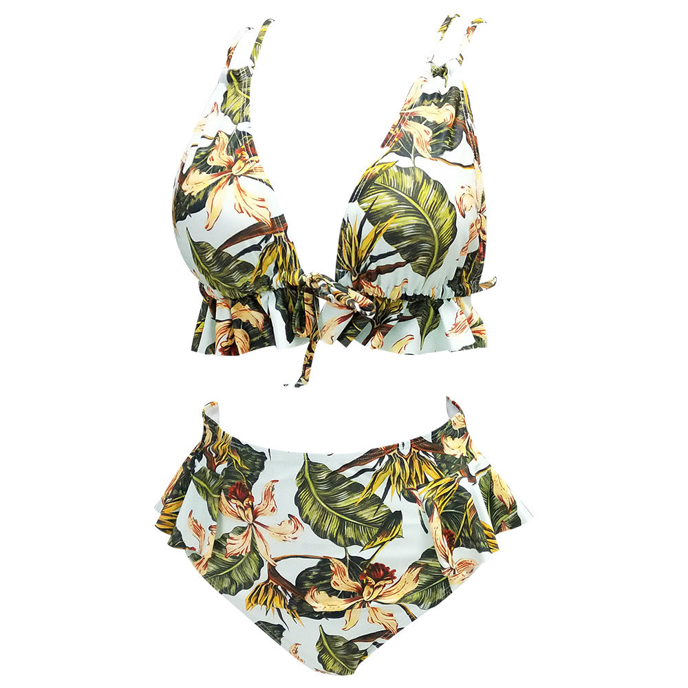 Dame bikini sæt med voluminøst flæse design og florale accenter Stilla