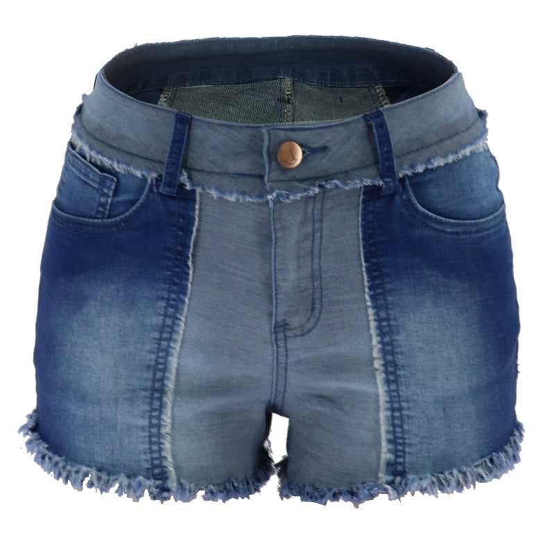 Dame moderigtige Denim-shorts i patchwork-design med frynset afslutning og høj talje Stilla