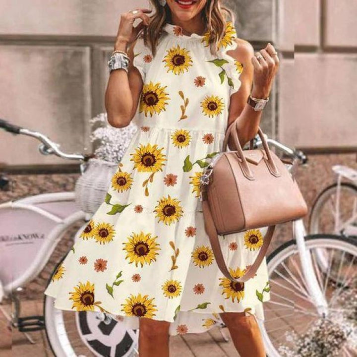 Damekjole med blomsterprint og flæser Stilla