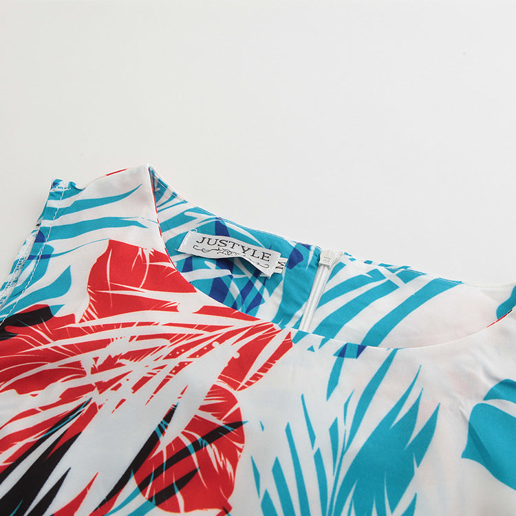 Dame retro-inspireret cocktailkjole med blomsterprint og taljebælte Stilla