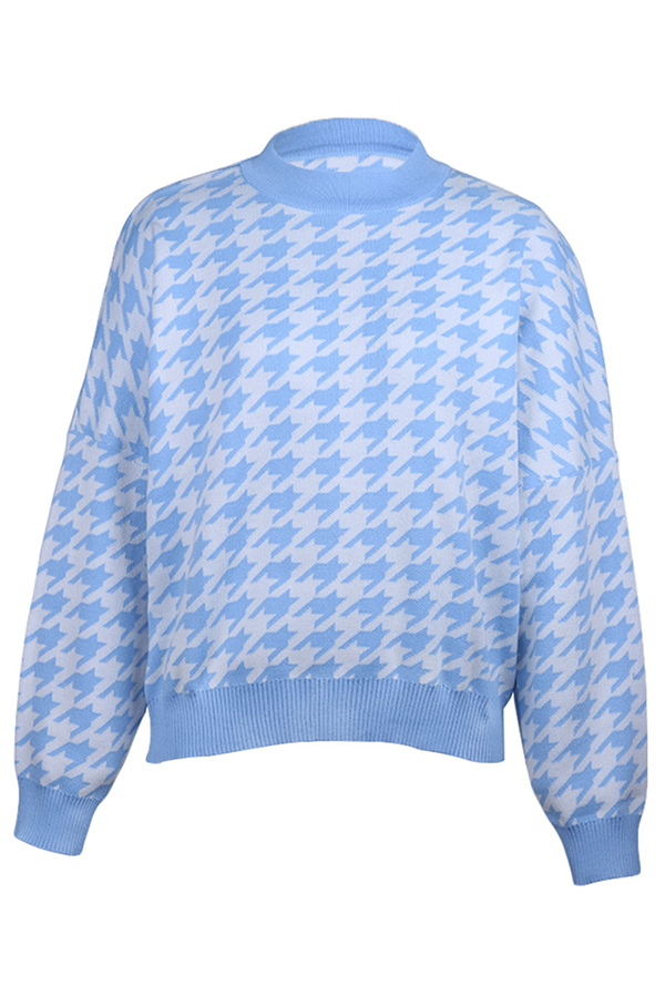 Stilla | Pullover med kontrasterende rundhalsudskæring i geometrisk patchwork mode gade
