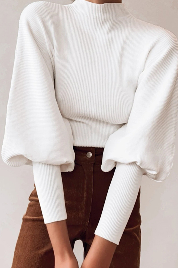Stilla | Lækker sweater med rullekrave i ensfarvet patchwork