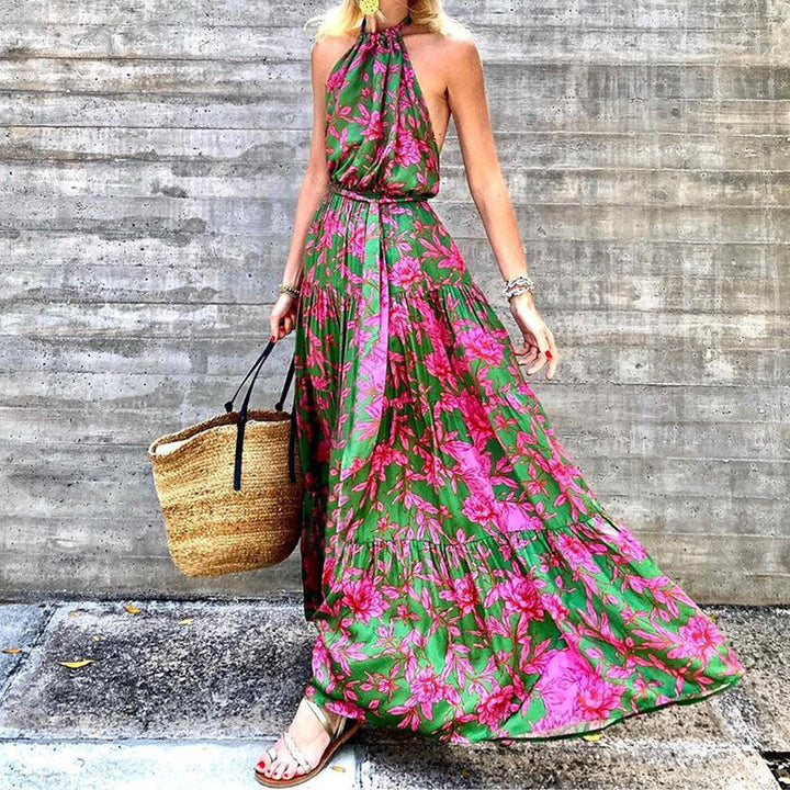 Dame maxikjole i boho-stil med blomsterprint og elegant udskæring Stilla