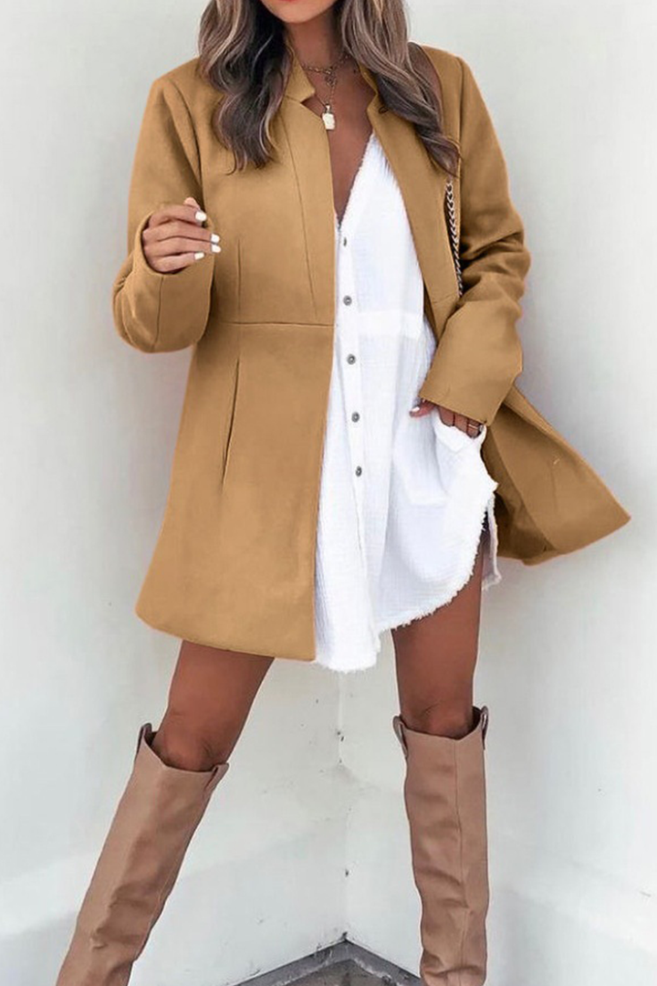 Stilla | Lette Outdoor Tøj Med Ensfarvet Strikjakke Krave I Patchwork Stil